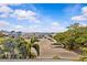 Scenic view features a marina, boat parking, and lovely waterfront buildings under a beautiful blue sky at 273 Shore Dr, Palm Harbor, FL 34683