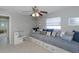 Charming bedroom featuring a built-in striped daybed with storage and playful decor at 2831 Quail Hollow W Rd, Clearwater, FL 33761