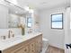 Bright bathroom boasts double sinks, modern fixtures, and a neutral color palette for a serene aesthetic at 2850 Allapattah Dr, Clearwater, FL 33761