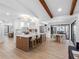 Bright, open kitchen boasts a large island, modern appliances, and stylish light fixtures at 2850 Allapattah Dr, Clearwater, FL 33761