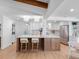 Spacious open kitchen with a large center island, stainless steel appliances, and modern lighting at 2850 Allapattah Dr, Clearwater, FL 33761