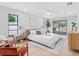 Tranquil main bedroom with backyard views and ensuite bathroom access at 2850 Allapattah Dr, Clearwater, FL 33761