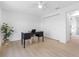 Bright home office with hardwood floors, closet, and views of the backyard at 2850 Allapattah Dr, Clearwater, FL 33761