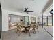 Covered outdoor patio area is perfect for dining and entertaining and is adjacent to the pool at 2850 Allapattah Dr, Clearwater, FL 33761