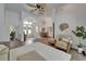 Welcoming foyer showcasing the home's open layout, dining area, and abundant natural light at 3060 Sutton Woods Dr, Plant City, FL 33566
