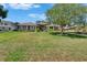 Charming single-story home featuring a well-manicured lawn and inviting facade at 3060 Sutton Woods Dr, Plant City, FL 33566