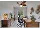 Office space with neutral paint colors and a ceiling fan for natural light and climate control at 3060 Sutton Woods Dr, Plant City, FL 33566