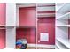 Spacious walk-in closet with built-in shelving and ample storage space at 3292 Covered Bridge E Dr, Dunedin, FL 34698
