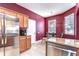 Updated eat-in kitchen features stainless steel appliances and a breakfast nook with lots of light at 3292 Covered Bridge E Dr, Dunedin, FL 34698