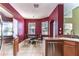 Open eat-in kitchen with stainless steel appliances and a breakfast nook with lots of light at 3292 Covered Bridge E Dr, Dunedin, FL 34698