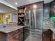 Kitchen featuring stainless steel appliances, granite countertops, and ample cabinet space at 3301 Elkridge Dr, Holiday, FL 34691