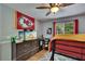 Modern bedroom with lofted bed and desk area, illuminated by natural light at 3314 Cypress Landing Dr, Valrico, FL 33596