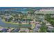 A sweeping aerial view of the community reveals lush landscaping and picturesque lakes at 3314 Cypress Landing Dr, Valrico, FL 33596