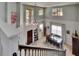 Dining room with high ceilings, large windows, a dining table for eight, and a decorative rug at 3314 Cypress Landing Dr, Valrico, FL 33596