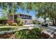Two-story home featuring a three-car garage, landscaping, and mailbox at 3314 Cypress Landing Dr, Valrico, FL 33596