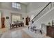 Bright and airy foyer with tile floors, staircase, and dining room at 3314 Cypress Landing Dr, Valrico, FL 33596