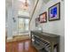 Foyer showcasing a staircase, chandelier, and console table at 339 Manatee Ln, Tarpon Springs, FL 34689