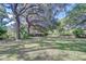 Expansive lot with mature trees, offering a serene and private setting for this property at 37348 Tucker Rd, Zephyrhills, FL 33541