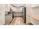 Modern kitchen featuring stainless steel appliances, sleek countertops, and contemporary cabinetry at 4018 Indianapolis Ne St, St Petersburg, FL 33703