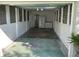 Spacious garage with extra storage space and a peek into the well-kept interior at 419 12Th Ave, Indian Rocks Beach, FL 33785