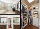 This collage features the main bathroom's layout, vanity and entrance to the large closet at 4204 W San Juan St, Tampa, FL 33629