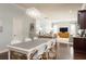Open-concept dining area flowing into the living room, creating a seamless and inviting living space at 4204 W San Juan St, Tampa, FL 33629