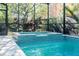 Hot tub within a screened enclosure, providing a private oasis for relaxation and recreation at 4204 W San Juan St, Tampa, FL 33629