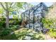 Hot tub and screened in lanai area create a private backyard oasis for relaxation and entertaining at 4204 W San Juan St, Tampa, FL 33629