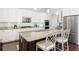 Lovely kitchen island with bar seating and stainless steel appliances at 4204 W San Juan St, Tampa, FL 33629
