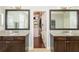 The main bathroom includes dual vanities, granite counters, and a view of the walk-in closet at 4204 W San Juan St, Tampa, FL 33629