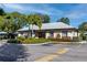 Charming community clubhouse with lush landscaping and ample parking, perfect for gatherings at 4215 E Bay Dr # 1806D, Clearwater, FL 33764