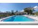 Large community pool featuring clear blue water and plenty of space for swimming and lounging at 4215 E Bay Dr # 1806D, Clearwater, FL 33764