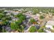 An aerial view featuring the home and its well-established neighborhood with mature trees and convenient roadways at 6328 S Harold Ave, Tampa, FL 33616