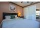 Bright bedroom with ceiling fan and a closet is the perfect cozy escape at 6328 S Harold Ave, Tampa, FL 33616