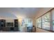 Living room area with a well lit workspace perfect for working from home at 6328 S Harold Ave, Tampa, FL 33616