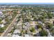 This aerial shot captures the neighborhood's attractive street layout, mature trees, and well-kept homes at 8431 52Nd N Way, Pinellas Park, FL 33781