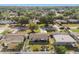 Aerial view of the home showing its well-kept lawn, patio with furniture, and fenced yard for privacy at 8431 52Nd N Way, Pinellas Park, FL 33781