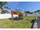 Relaxing backyard seating area with shade umbrellas at 8431 52Nd N Way, Pinellas Park, FL 33781