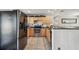 This kitchen boasts stainless steel appliances, tile flooring, and warm wood cabinetry for a functional design at 8431 52Nd N Way, Pinellas Park, FL 33781