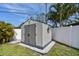Backyard shed and white fence at 8431 52Nd N Way, Pinellas Park, FL 33781