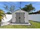 Backyard storage shed with double doors at 8431 52Nd N Way, Pinellas Park, FL 33781