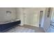 Bedroom features a bed, new flooring, and plenty of space at 8623 Stonehedge Way, Hudson, FL 34667