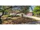 Charming single-story home with a well-maintained front yard and a two car garage, offering curb appeal at 8623 Stonehedge Way, Hudson, FL 34667