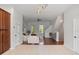 Spacious living room featuring hardwood floors, modern decor, ceiling fan, and an open layout, perfect for entertaining at 956 Sombra St, Tampa, FL 33619