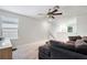 Living room with a view of the second story landing and open floor plan at 9617 Channing Hill Dr Dr, Ruskin, FL 33573