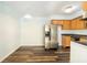 Updated kitchen featuring stainless steel refrigerator and wood cabinets at 1021 Apollo Beach Blvd # 6, Apollo Beach, FL 33572