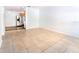 Bright living room with tile flooring next to kitchen with stainless steel appliances at 1021 Apollo Beach Blvd # 6, Apollo Beach, FL 33572