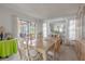 Elegant dining room with a bright atmosphere is enhanced by natural light from the lanai view at 1034 Mandarin Dr, Holiday, FL 34691