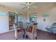 Relaxing lanai is perfect for dining or lounging while enjoying the views and outdoor ambiance at 1034 Mandarin Dr, Holiday, FL 34691