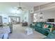 Inviting living room open to the dining area, with abundant natural light at 1034 Mandarin Dr, Holiday, FL 34691